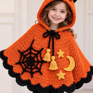 May include: An orange crochet hooded cape featuring a black spiderweb appliqué, two yellow stars, a yellow crescent moon, and a black scalloped border. The hood includes black cat ears and a green stem, with black ties ending in yellow tassels.