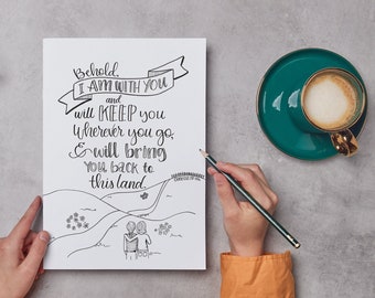 May include: A white card with black calligraphy that reads "Behold I AM WITH YOU and will KEEP you wherever you go & will bring you back to this land". The card is on a gray surface with a cup of coffee, a pair of glasses, and scissors.
