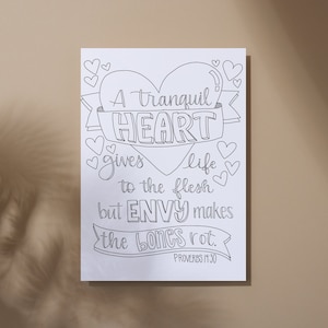 May include: A black and white printable coloring page with a heart shape and the text "A tranquil HEART gives life to the flesh but ENVY makes the bones rot. PROVERBS 11:30".