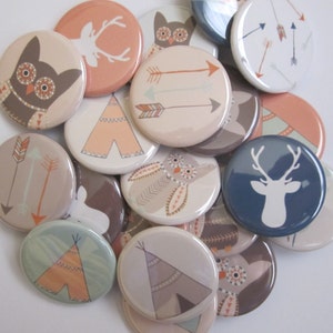 May include: A collection of round, colorful buttons with various designs. The designs include owls, deer, arrows, and teepees. The buttons are perfect for crafts, scrapbooking, and other creative projects.