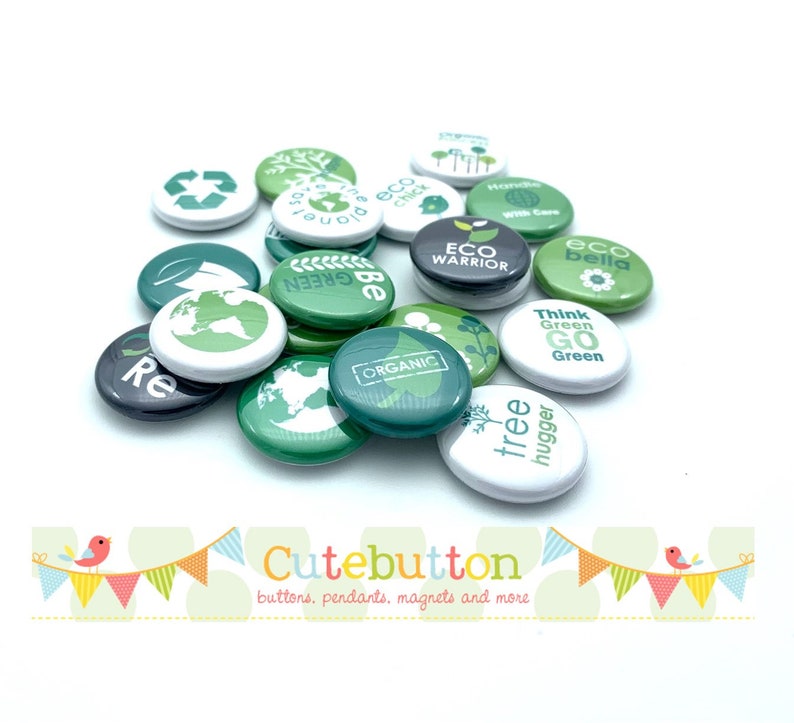 May include: A collection of green and white round buttons with eco-friendly messages, such as "Eco Warrior", "Think Green Go Green", and "Tree Hugger".