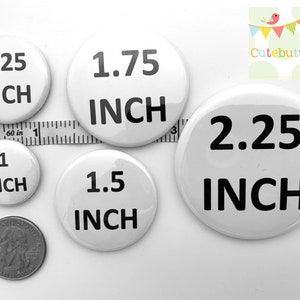 May include: Five white round buttons with black text indicating different sizes: 1 inch, 1.25 inches, 1.5 inches, 1.75 inches, and 2.25 inches.