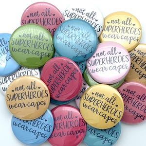 not all super heroes wear capes buttons / set of TWENTY / various sizes and backs / great coworker gift