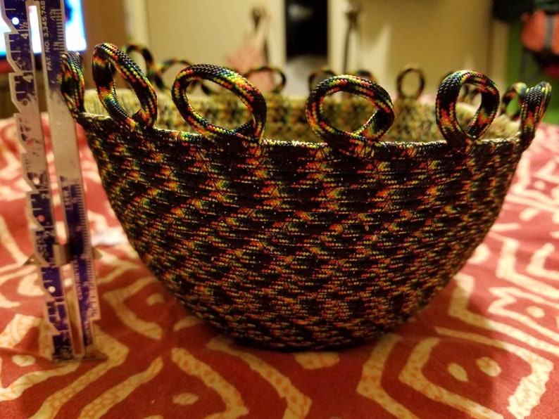 Sewn paracord bowl or basket with decorative loops around the Etsy