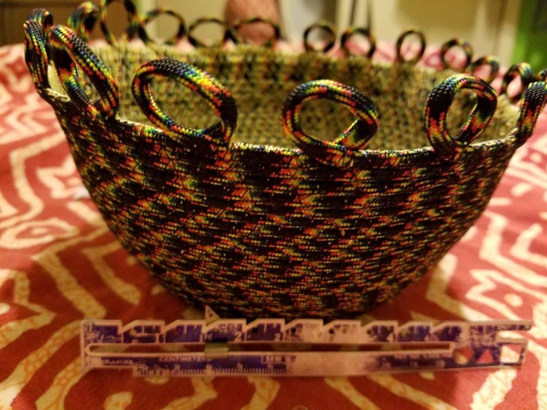 Sewn paracord bowl or basket with decorative loops around the Etsy