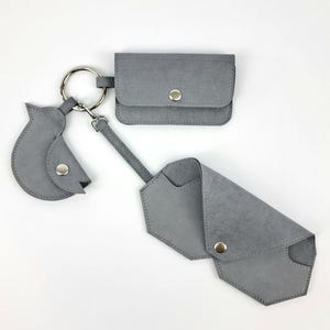 Set di accessori in morbida pelle (porta carte, porta occhiali, porta monete)