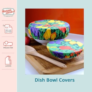May include: Two fabric bowl covers with a colorful fruit print. The covers are made of a soft, stretchy fabric and are designed to fit snugly over bowls of various sizes. The covers are a great way to keep food fresh and prevent spills.