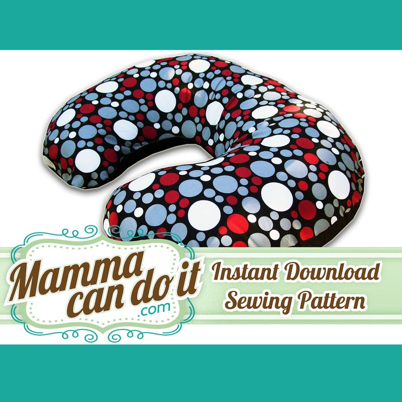 May include: A crescent-shaped nursing pillow with a black base and a pattern of red, white, and blue circles. The pillow has the text "Mamma can do it .com" and "Instant Download Sewing Pattern".