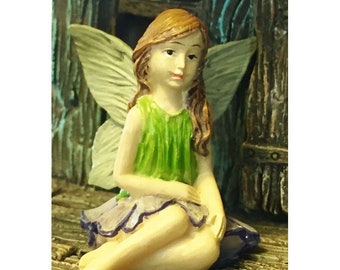 Fairy Greta (1 1/2” tall) Sitting in her Fairy Garden