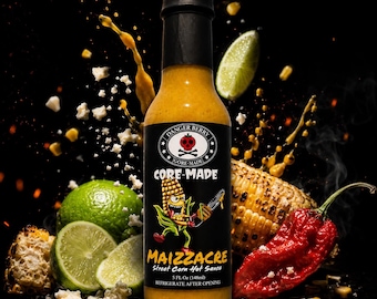 May include: A glass bottle of Maizzacre Street Corn Hot Sauce with a black cap. The label features a cartoon corn character holding a chainsaw, the text Danger Berry Gore-Made, and states 5 FL Oz (148ml). The sauce is a vibrant yellow-orange color.