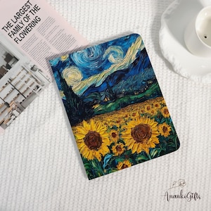May include: A notebook featuring a vibrant print of Van Gogh's "Starry Night" and sunflowers. The cover showcases the iconic swirling blue sky, a dark tree, and a field of yellow sunflowers. The notebook is open, revealing the interior pages.