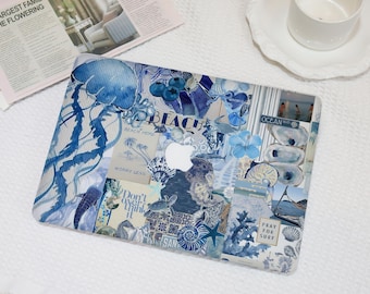 May include: A blue and white collage design on a laptop. The design includes images of jellyfish, seashells, and the word "BEACH". Other text includes "OCEAN", "PRAY FOR SURF", "Don't overthink it", and "BEACH MORE".