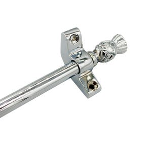 May include: A chrome-finished curtain rod with decorative end finial. The rod features a sleek, polished surface and mounting brackets. The finial has a textured, detailed design. The hardware is designed for window treatments.