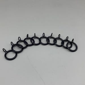 Anillos metálicos para brazo extensible de cortina (paquete de 10)