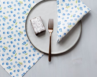 Dinning napkins with wide edge and mitered corners with Blueberry print.