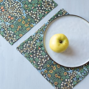 Dinning napkins with wide edge and mitered corners with William Morris Blackthorn print.