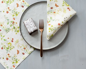 Napkins set. Dinning napkins with wide edge and mitered corners, linen napkins with strawberry and butterfly print