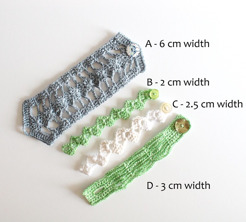May include: Four handmade crochet items in shades of gray, green, and white. The gray piece is 2.36 inches wide, and the green pieces are 0.79 and 1.18 inches wide. The white piece is 0.98 inches wide. Each has a button closure.