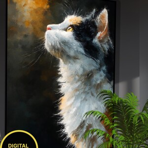 May include: A framed digital download print of a calico cat looking upwards. The cat has white, black, and orange fur, with yellow eyes and a pink nose. The background is dark with orange and yellow highlights. The print is labeled "DIGITAL DOWNLOAD".