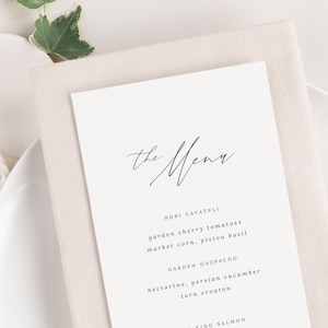 May include: A white menu card with the word "the Menu" written in cursive at the top. The menu lists various dishes, including Nori Cavatelli, Garden Gazpacho, Ora King Salmon, and Marin Farms Beef Tenderloin.