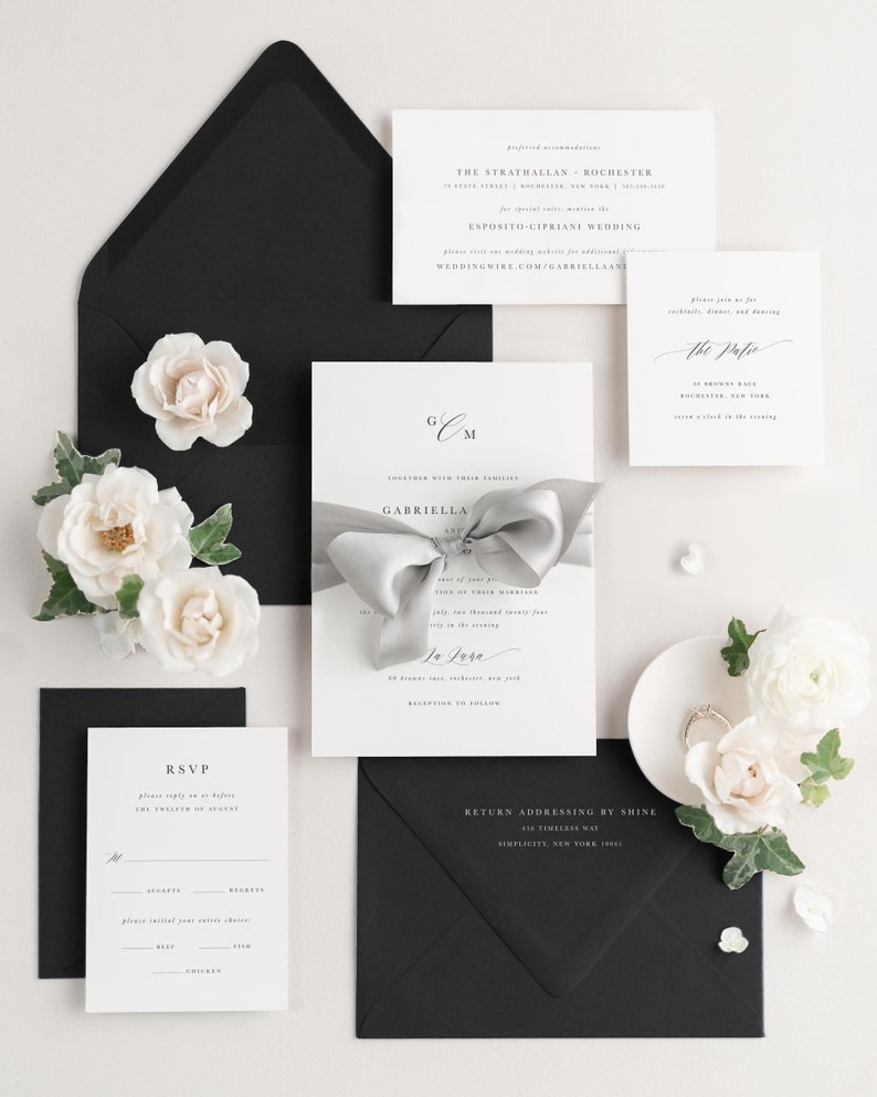 Gabriella invitation styled with fog ribbon and onyx envelopes.