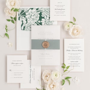 May include: A wedding invitation suite with a green floral pattern on the envelope. The invitation card is white with a light blue ribbon and a wax seal. The RSVP card is white with a gray border. The text on the invitation card reads "Join us for dinner and dancing under the stars at The Cullender Garden 414 Mellolland Road Malibu, California Seven Thirty in the Evening". The text on the RSVP card reads "Kindly Respond Please reply on or before the month of June Accepts with pleasure Number attending Declines with regret Return Addressing by Helen 436 Timeless Way Simplicity New York 10001". The text on the accommodations card reads "Accommodations for preferred accommodations please mention the Phillips-Richards Wedding Book your stay at June Month Calamigos Guest Ranch Club 327 Latigo Canyon Road Malibu, California 90265 For more information about your trip to Malibu visit www.calamigosranch.com".
