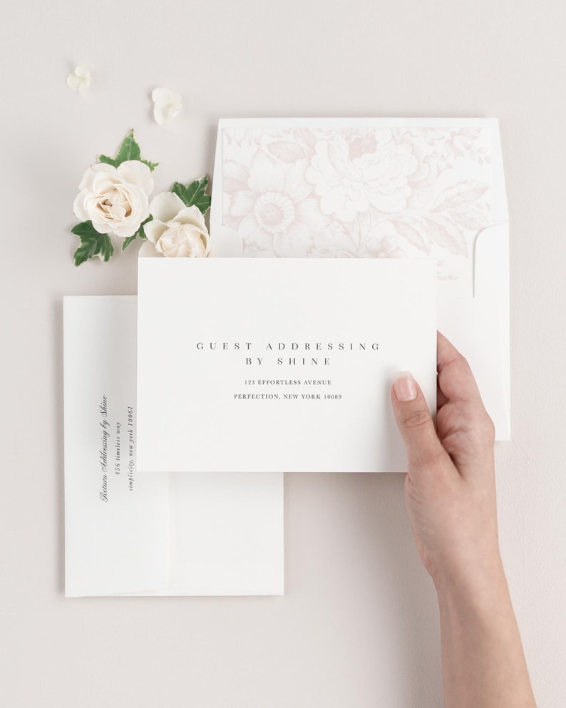 Zarah save the date envelopes with guest addressing, return addressing, and a garden rose envelope liner.