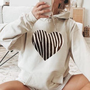 Zebra Heart Hoodie: Cozy Animal Print Pullover