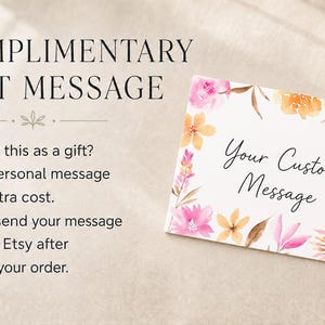 May include: A rectangular white gift card featuring a watercolor floral border in shades of pink, orange, and brown. The card displays the text "Your Custom Message" in black script. The image also includes the text "COMPLIMENTARY GIFT MESSAGE" and instructions for adding a personal message to an order.