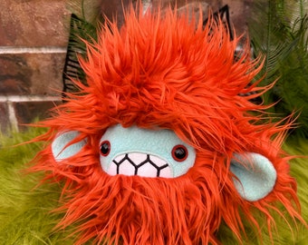 Severed pygmy yeti head plush.....Handmade monster stuffed animal.... shaggy orange