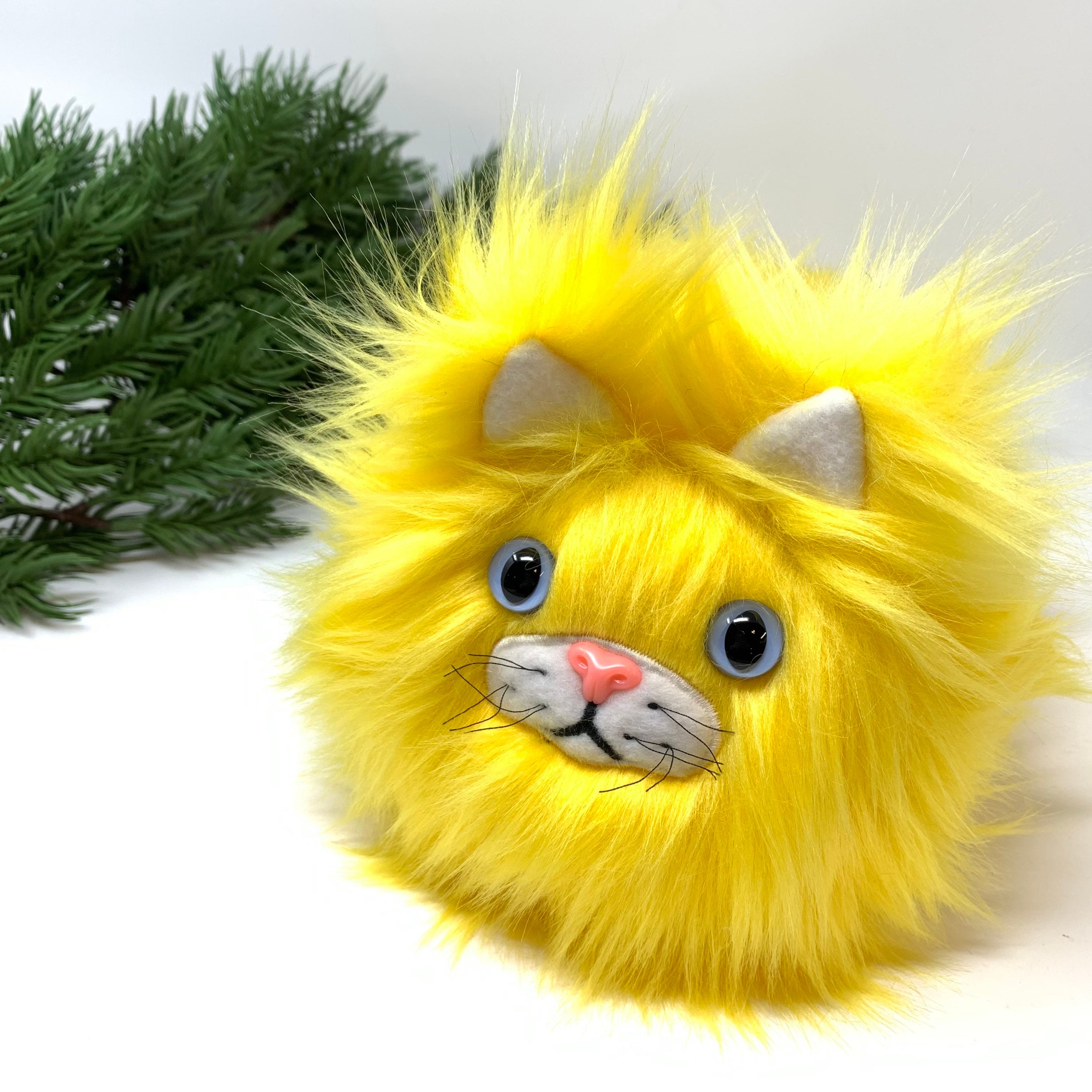yellow stuffed cat