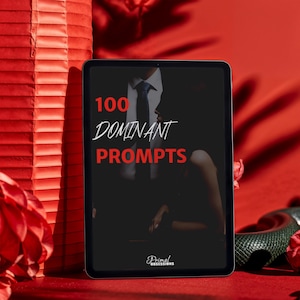 Könnte beinhalten: Ein Tablet-Bildschirm zeigt ein Schwarzweißbild eines Paares mit dem Text "100 DOMINANT PROMPTS" in Rot. Der Text "Primal Obsessions" befindet sich in Weiß am unteren Bildschirmrand.