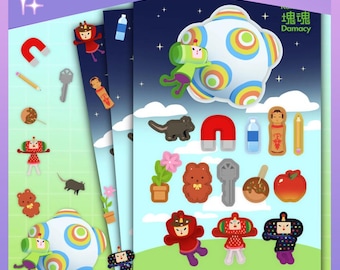 May include: A sticker sheet featuring Katamari Damacy characters and various objects including a red magnet, a pencil, a key, a water bottle, a potted flower, a brown bear, a takoyaki ball, an apple, and several colorful figures against a sky background.