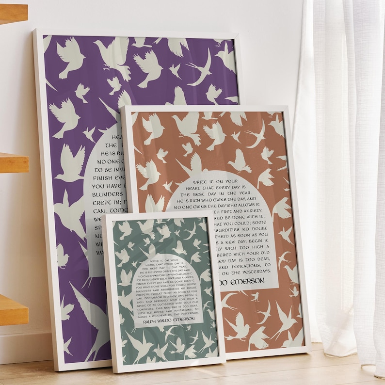 May include: Three framed prints with a white background and white silhouettes of birds. The prints have a quote by Ralph Waldo Emerson: "Write it on your heart that every day is the best day in the year. He is rich who owns the day, and no one owns the day who allows it to be invaded by anxiety..."