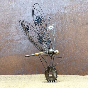 Image showcasing Metal Dragonfly Sculpture on Stand: Handmade Art With Intricate Wings ...