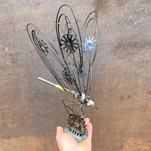 Image showcasing Metal Dragonfly Sculpture on Stand: Handmade Art With Intricate Wings ...