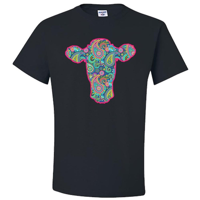 May include: Black t-shirt featuring a colourful paisley pattern cow head design.