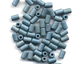 Package of 100 Columbia Blue Ceramic Beads 6X10 mm, hole about 2.5 mm #39