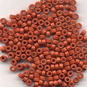 Orange Ceramic Beads 6x4mm hole about 2.5 mm Package of 100 beads (#24)