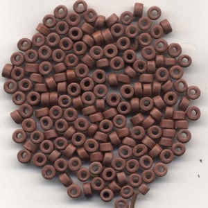 Terra Cotta Ceramic Beads 6x4mm hole about 2.5 mm Package of 100 beads #27