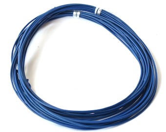 May include: Coiled bundle of blue wire, tightly wound and secured with silver bands. The wires are a vibrant shade of blue, creating a circular shape against a white background. The image is a close-up shot, highlighting the texture and color of the wire.