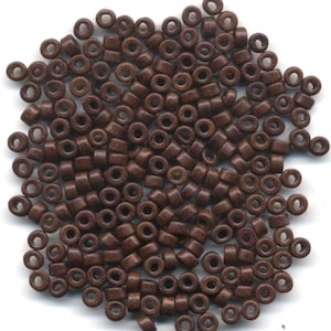 Ceramic Beads 6x4mm hole about 2.5 mm Package of 100 beads #14 Dark Brown
