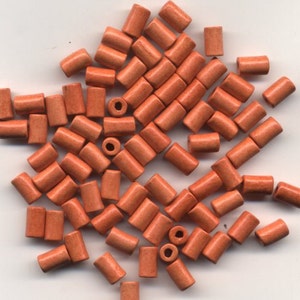 Package of 100 Orange Ceramic Beads 6X10 mm, hole about 2.5 mm  #24