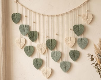 Ghirlanda di foglie in macramè in stile boho – Decorazione murale botanica verde con dettagli in legno