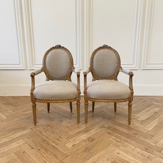 A Large Pair Of Louis Xvi Style Gilt Wood Arm Chairs Auction