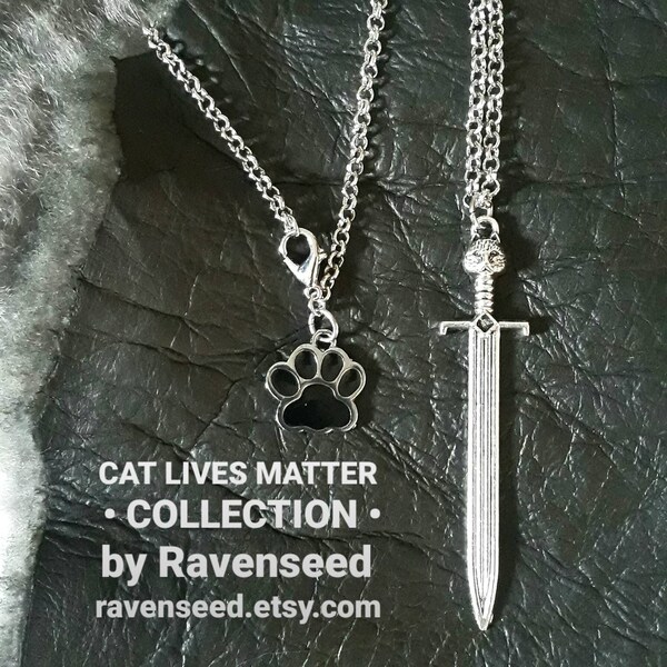CatCalibur Sword Pendant Necklace, 2.5 in Long With Swarovski Crystal Gem  and Enameled Paw Charm, On Rolo Style Chain, Antique Silver-tone