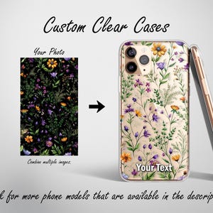 May include: Clear phone case with a floral design featuring yellow, purple, and orange flowers. The case is shown next to a phone with a gold frame. The text "Custom Clear Cases" and "Your Text" are visible. The image also shows a sample photo.