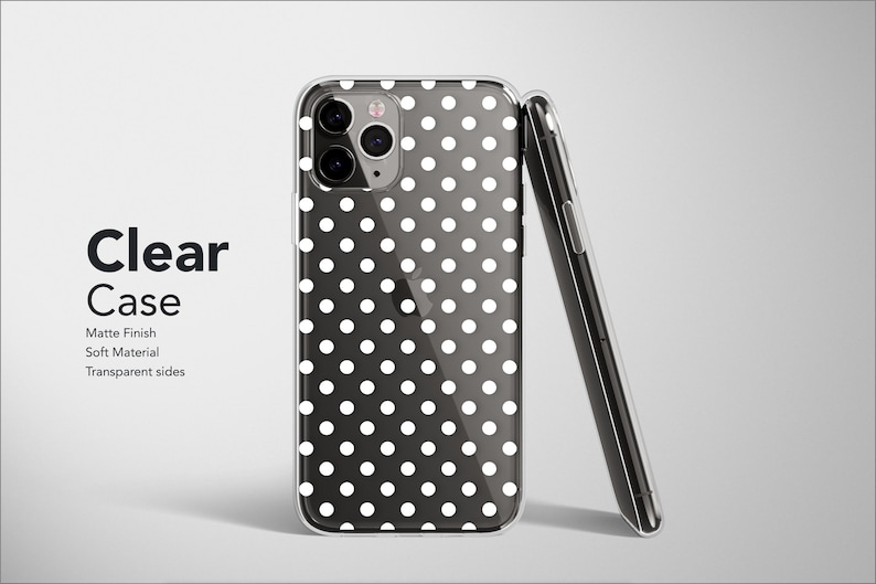 May include: A clear phone case with a white polka dot pattern. The case has a matte finish and is made of a soft material. The sides of the case are transparent.