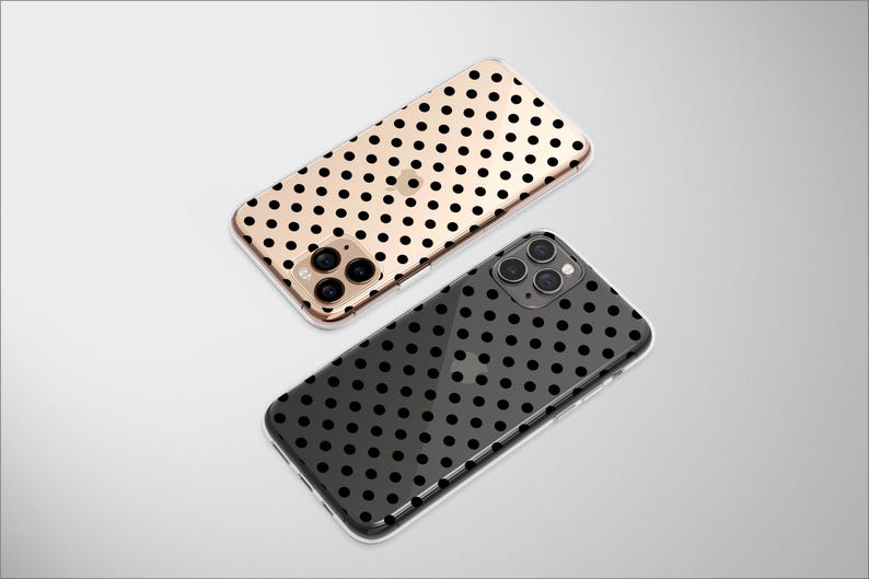 May include: Two smartphone cases with a polka dot pattern. One case is gold with black dots, and the other is black with black dots. The cases have a clear, protective design and are shown on a white background.