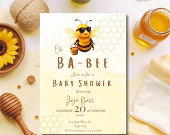 May include: Baby shower invitation with a cartoon bee wearing sunglasses and holding a bucket. The invitation reads "Oh Ba-Bee, Join us for a Baby Shower" with event details. The background is yellow with honeycomb patterns, sunflowers, and honey.